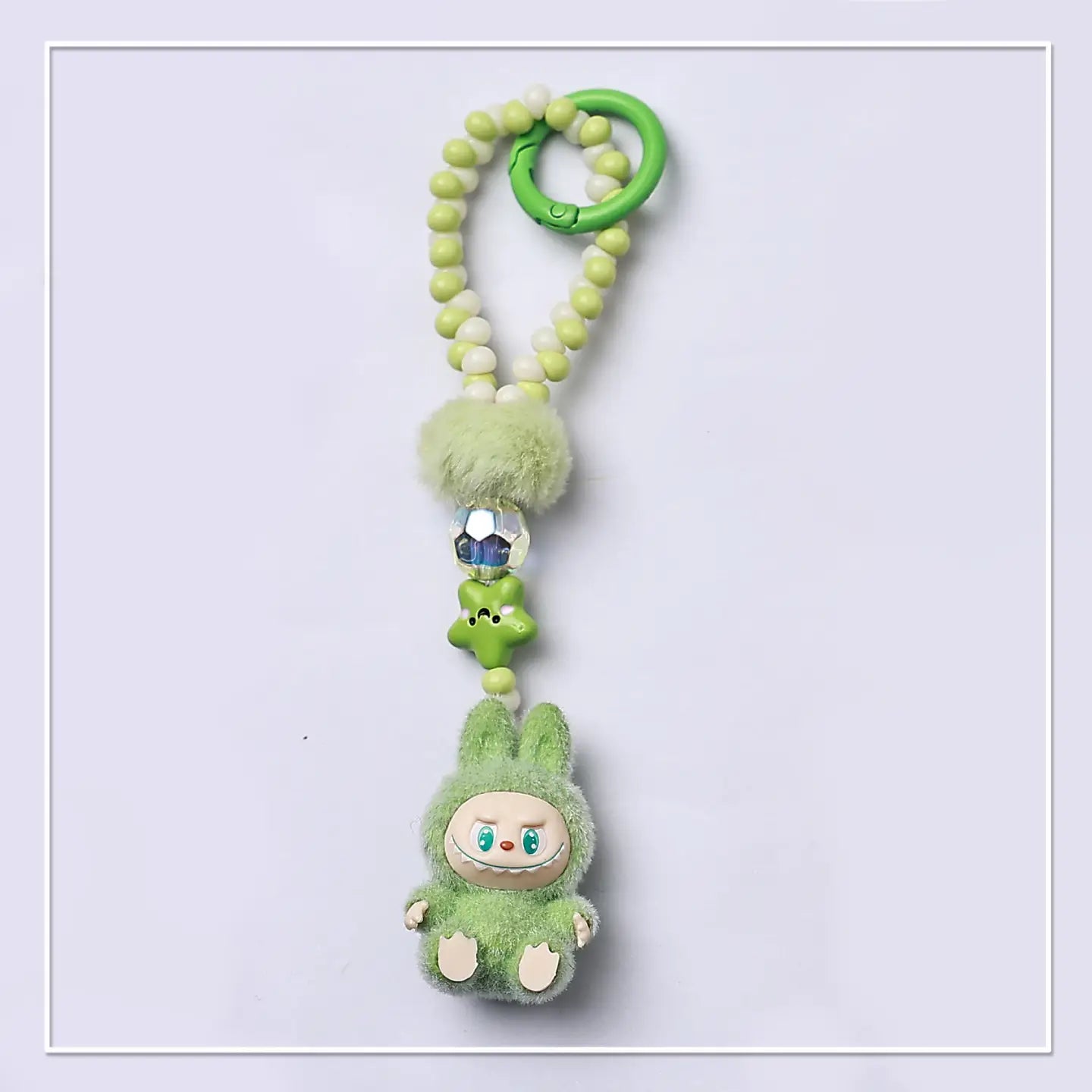 FLOCKED MINI MONSTER KEYCHAIN
