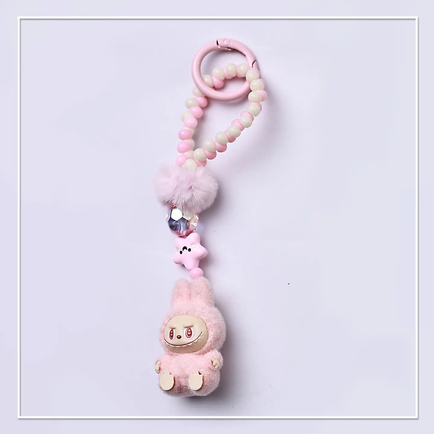 FLOCKED MINI MONSTER KEYCHAIN
