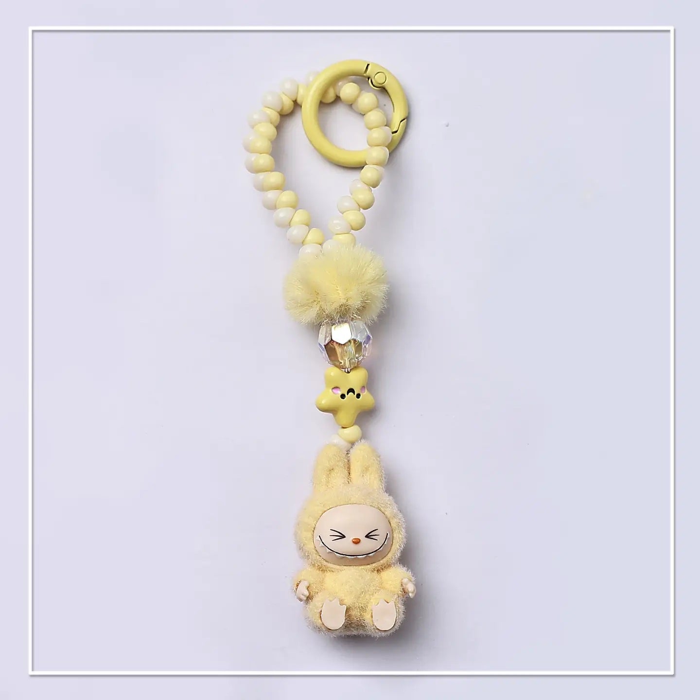 FLOCKED MINI MONSTER KEYCHAIN