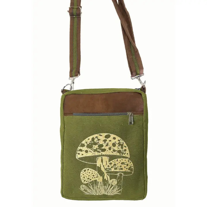 A stylish green and brown crossbody bag featuring an unique mushroom illustration