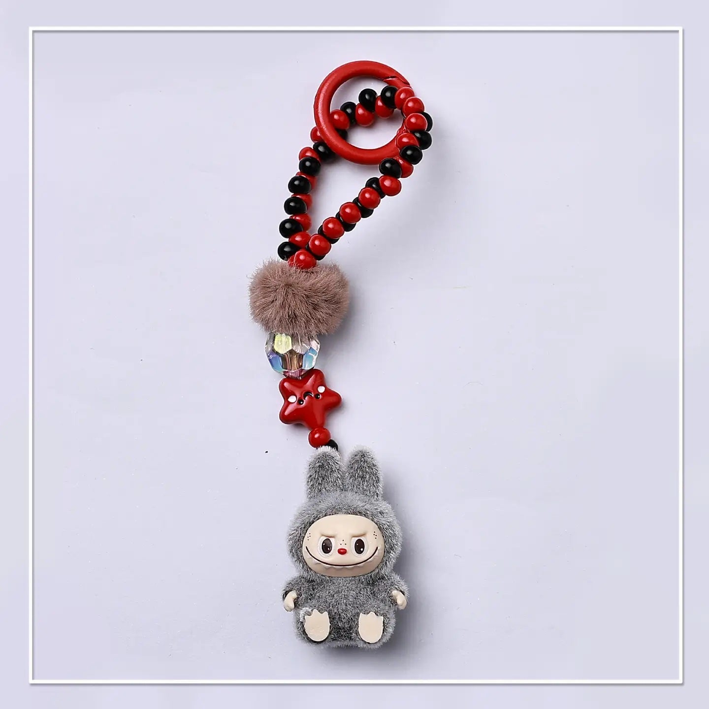 FLOCKED MINI MONSTER KEYCHAIN