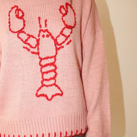Lobster sweater with stitching hem