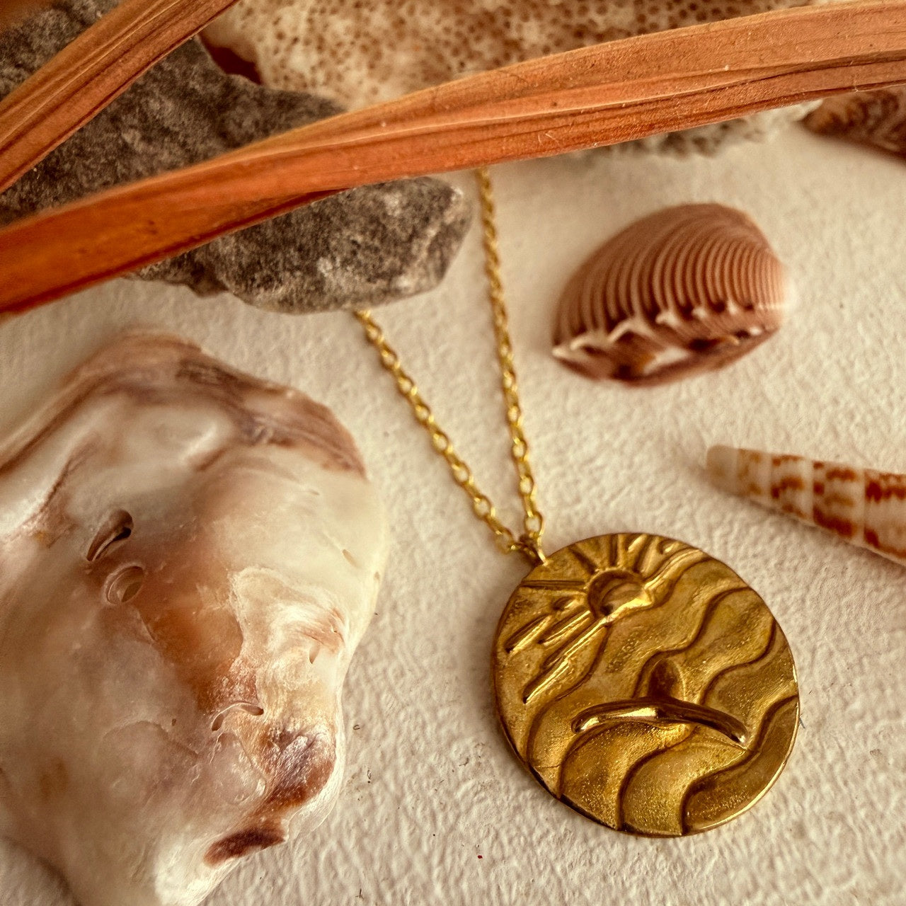 "Samana" Whale Tail & Sea Charm Necklace in Raw Brass