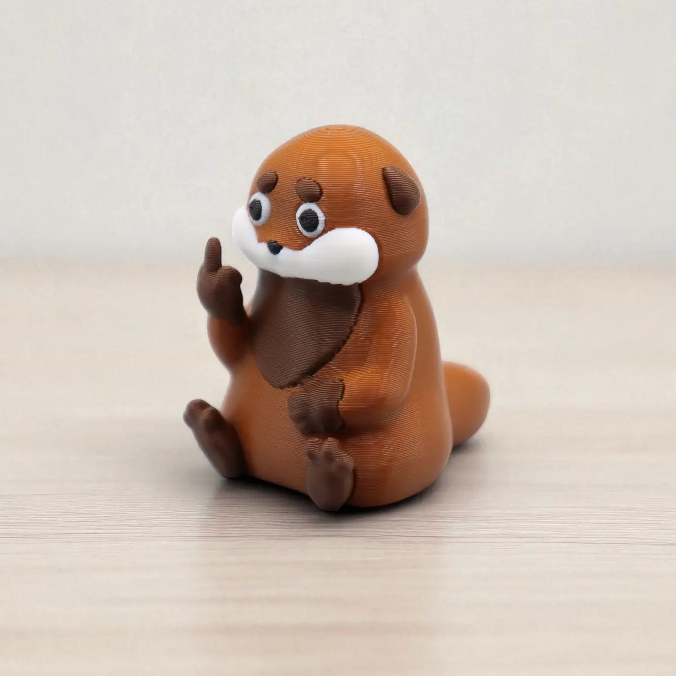 Otter Middle Finger Figurine