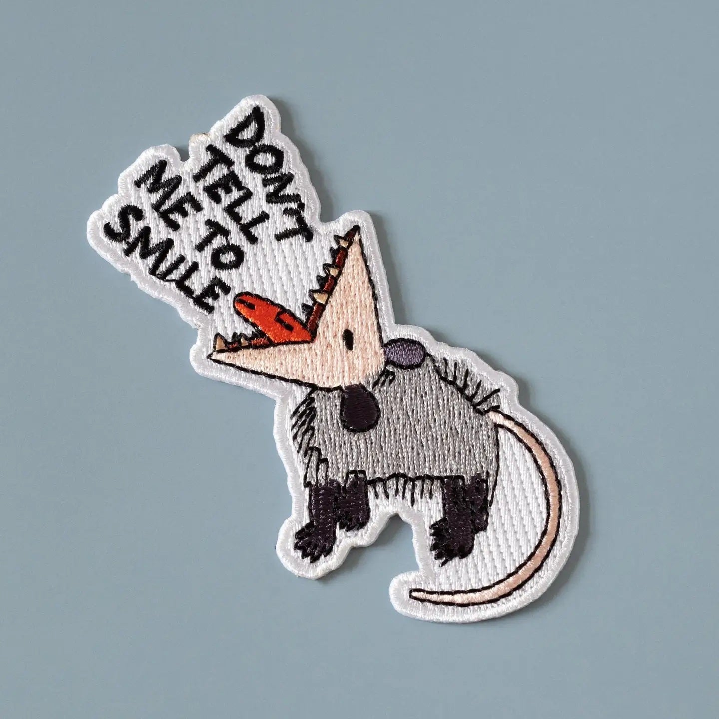 Don’t Tell Me To Smile Possum Iron-On Patch