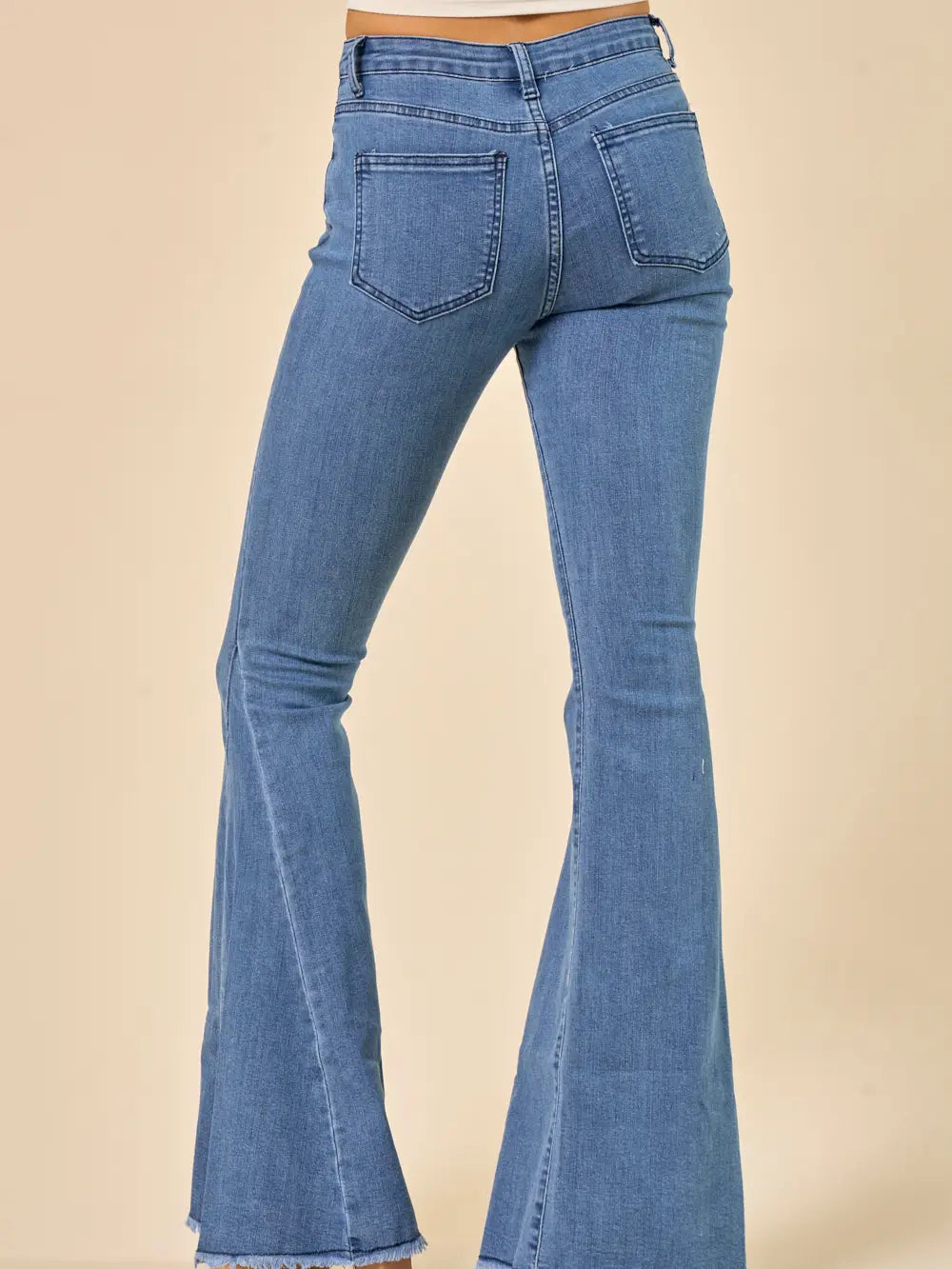 Midtone Denim Washed Flares With Fringed Bottom