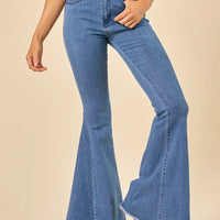 Midtone Denim Washed Flares With Fringed Bottom
