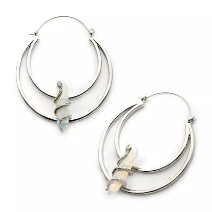 Cintres en cristal enveloppés de serpent