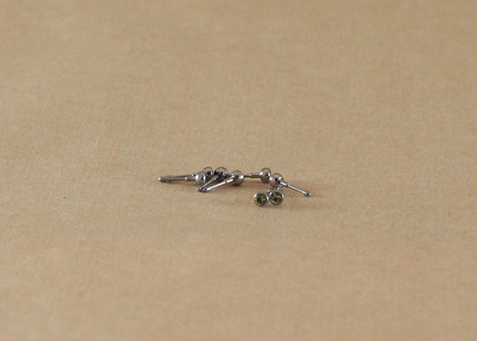 16G TI BEZEL GEM 2MM PERIDOT
