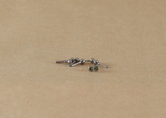 16G TI BEZEL GEM 2MM PERIDOT