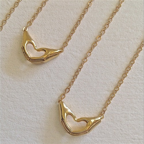 Love Hands Gold Pendant