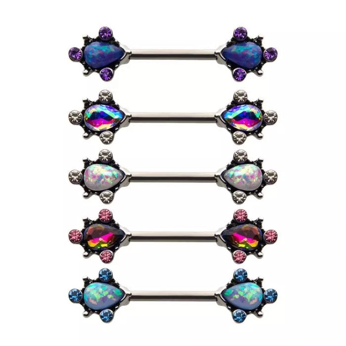 Centro en forma de lágrima con 3 gemas alrededor