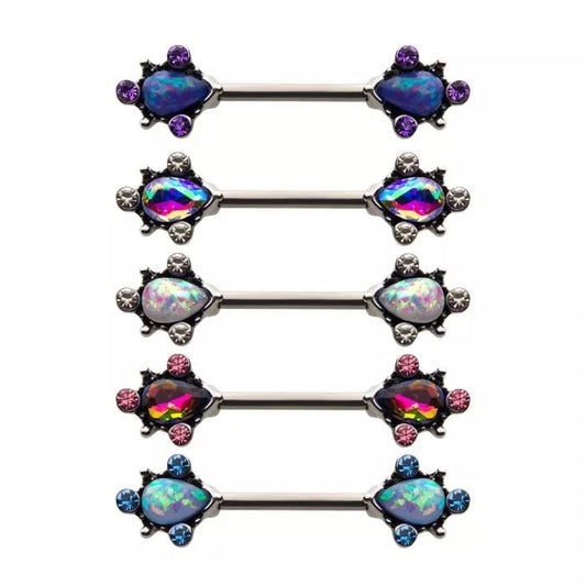 Centro en forma de lágrima con 3 gemas alrededor